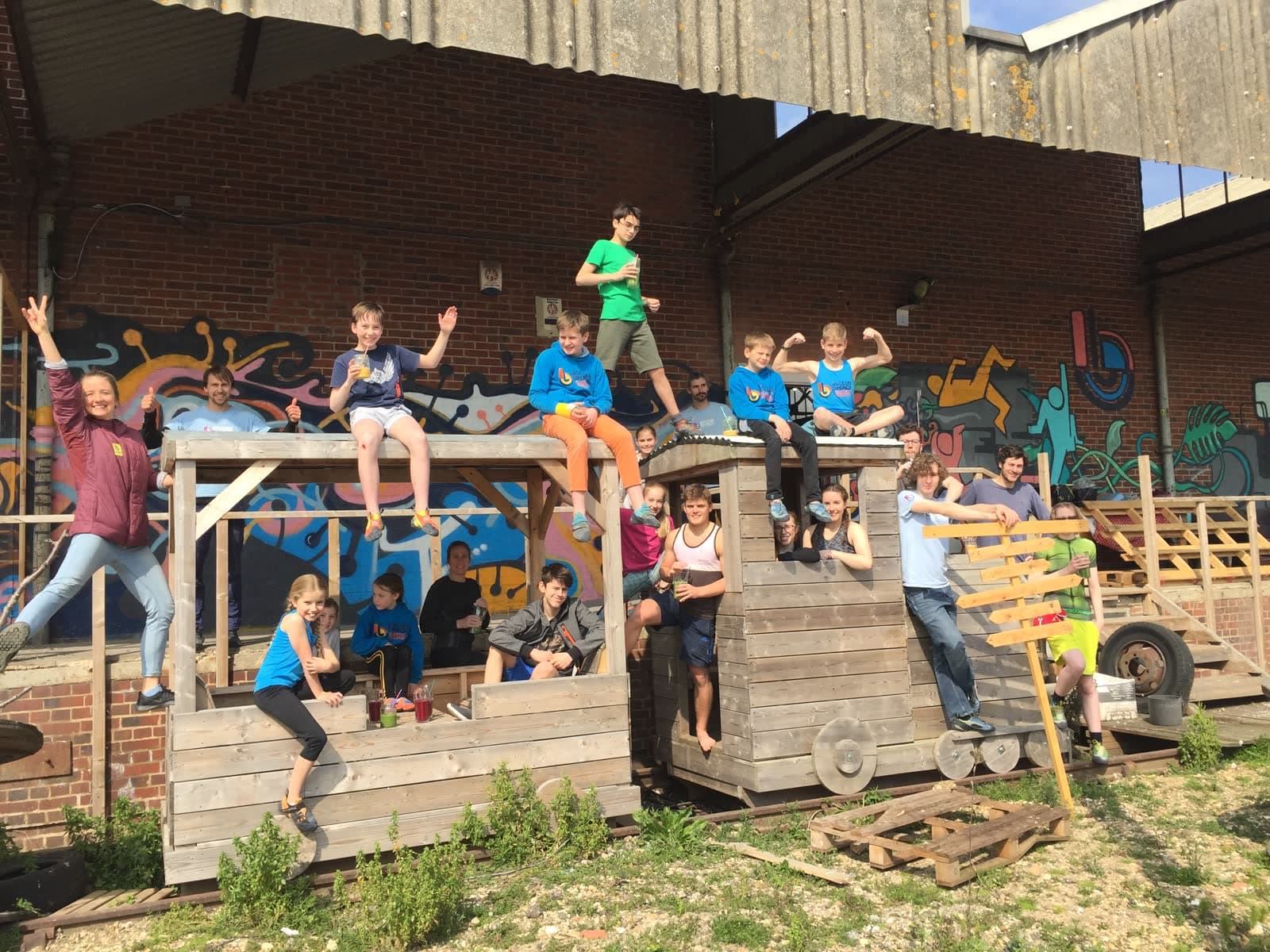 Members and families gathered outside for a summer party