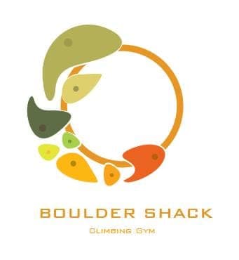 A logo made of climbing holds arranged in a ring