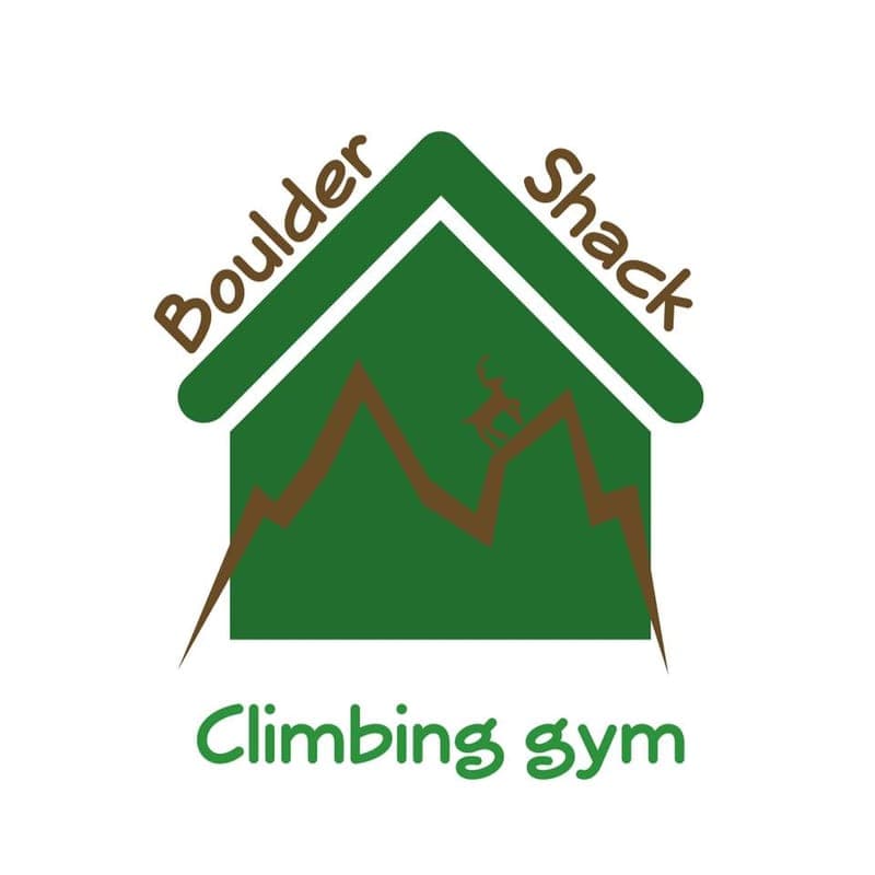 A logo of a green house with a mountain range inside it